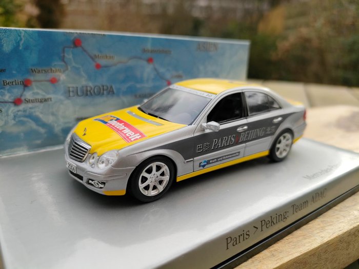 Preview of the first image of MiniChamps - 1:43 - Mercedes-Benz E Klasse,rally Parijs Peking - limited edition of only 500 pieces.
