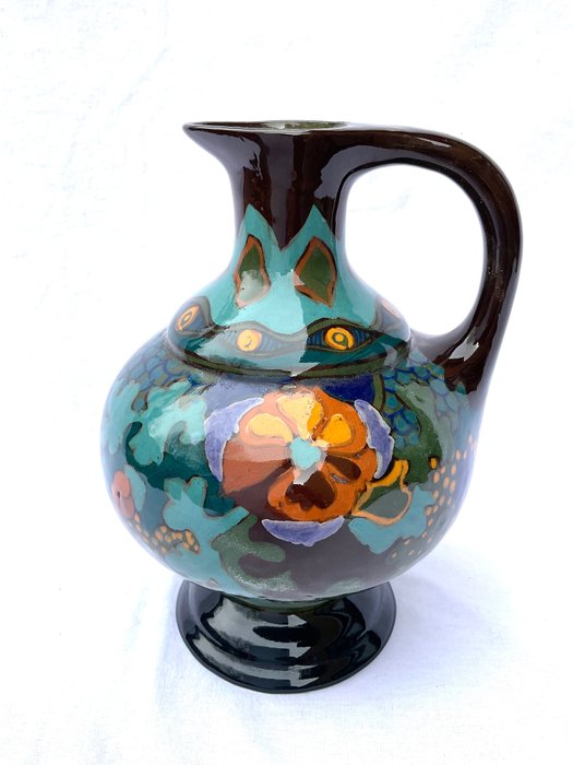 Preview of the first image of Willem Hartgring - Arnhemse Fayencefabriek - Earthenware Art Nouveau jug.