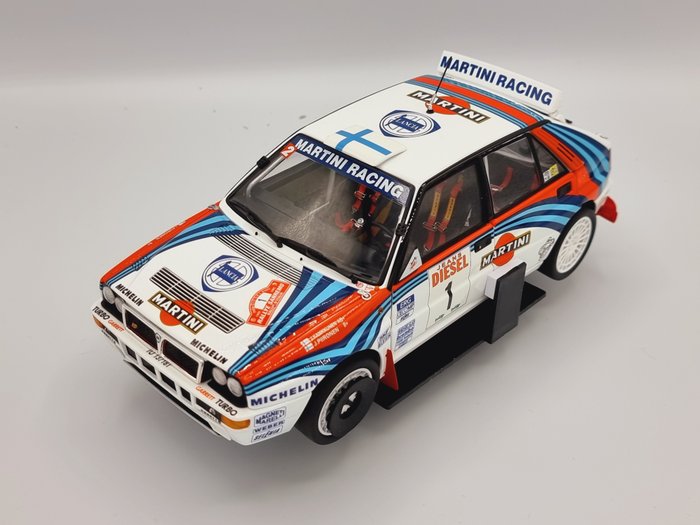 Preview of the first image of Kyosho - 1:18 - Lancia Delta Integrale Kankkunen - Rally Sanremo 1992 - no. 8348D.