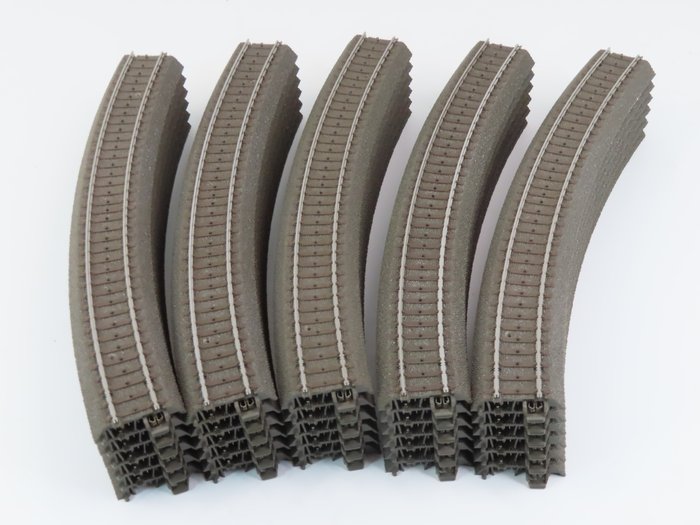 Preview of the first image of Märklin H0 - 24330 - Tracks - 30-part rail lot with curved rail pieces, C-rail.