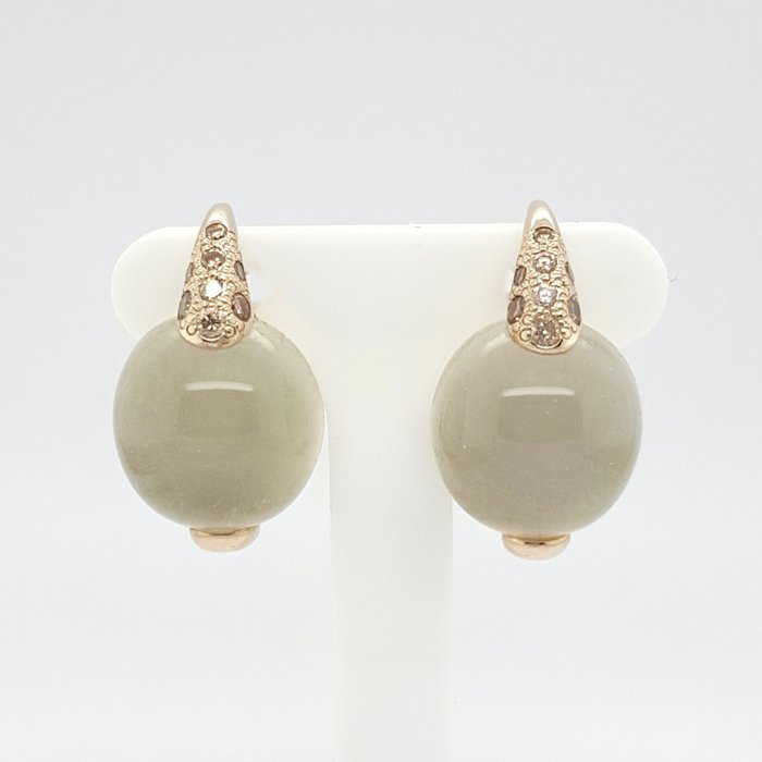 Preview of the first image of Pomellato - 18 kt. Yellow gold - Earrings - 2x Cabochon cut moonstone, 2x 8 cognac colored brillian.