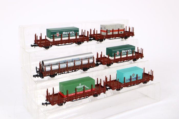 Preview of the first image of Minitrix, Roco N - Freight carriage - Six stake wagons with cargo - DB.