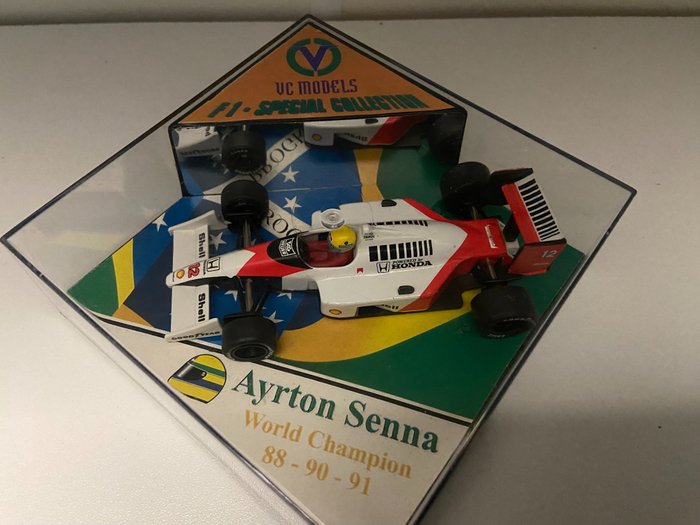 Preview of the first image of Onyx - Vitesse VC Models - 1:43 - McLaren - box with Brasil flag and mirror wall.