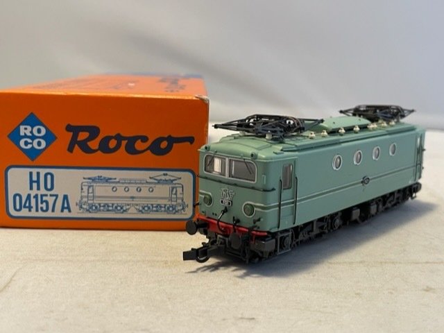 Preview of the first image of Roco H0 - 43464 - Electric locomotive - Series 1100 in Turquoise livery of the Dutch Railways - (84.
