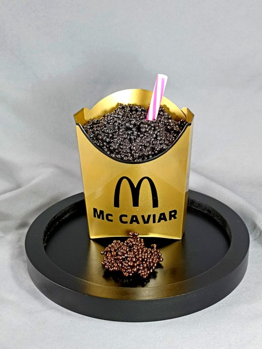Preview of the first image of XTC Artist - Mc Caviar Gold black with Orange Straw.