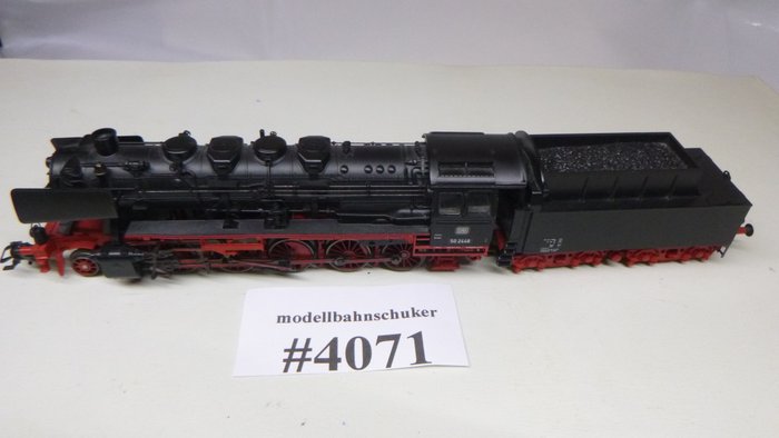Preview of the first image of Märklin H0 - aus 37840/37844 - Steam locomotive with tender - BR 50 modified version, please read -.