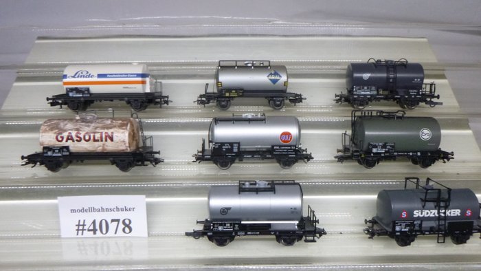 Preview of the first image of Fleischmann, Märklin, Roco, Trix H0 - Freight carriage - 8 piece mix tanker train set - # 4078 - DB.