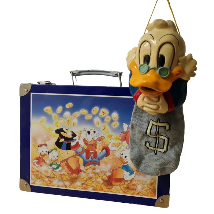 Preview of the first image of Walt Disney - Uncle Scrooge suitcase and savings stocking (ca. 1975).