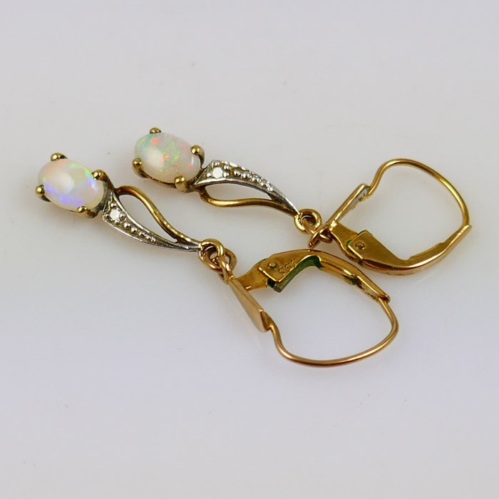 Preview of the first image of 8 kt. Bicolour, Gold - Earrings Opal - Diamonds.