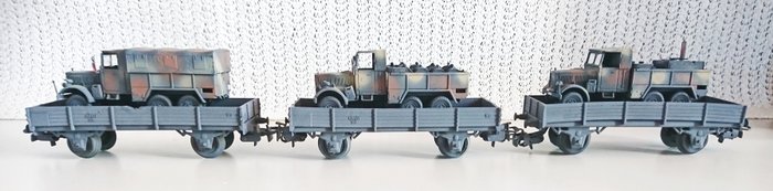 Preview of the first image of Märklin H0 - Freight carriage - 3 unit diesel with tarpaulin, barrel tank system and field kitchen.