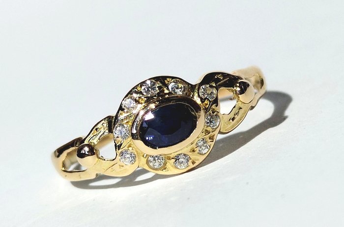 Preview of the first image of 18 kt. Yellow gold - Ring - 0.20 ct Sapphire - Diamonds.