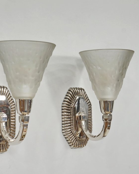 Preview of the first image of Capon & Muller Frères - A pair of French art deco wall lights.