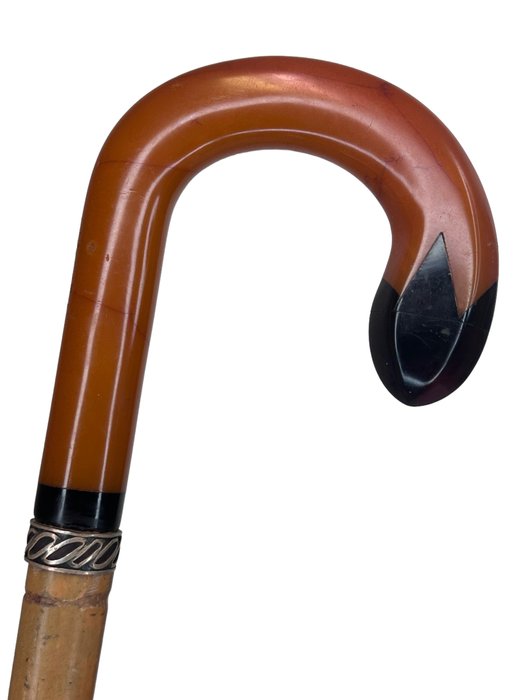 Preview of the first image of Walking stick, Amber colored hook handle.