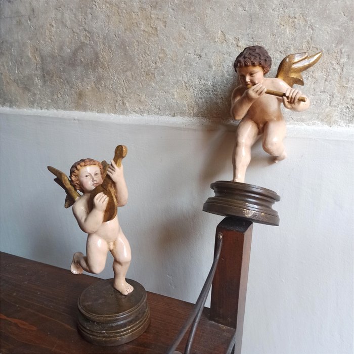 Preview of the first image of Sculpture, Pair of cherubs playing - 24 cm - Wood pulp - 1930 / 1940 approx.
