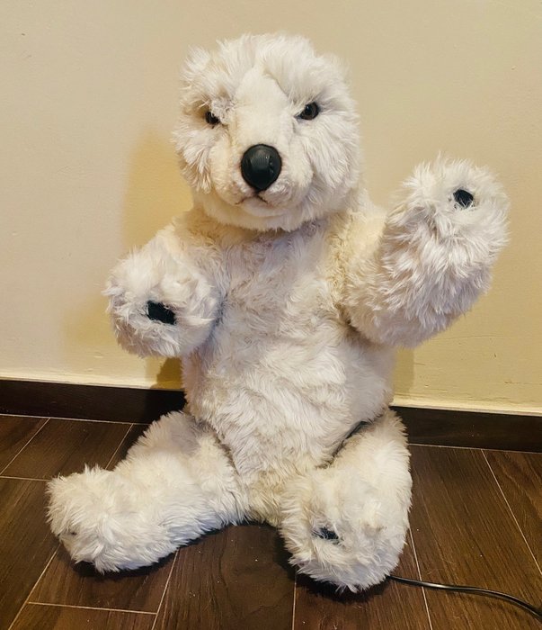 Preview of the first image of Unbranded - Lifesize Polar Bear Cub - Mechanical Stuffed Animal - Realistic Animatronic Moves - 200.