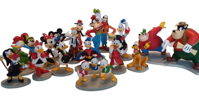 Mickey, Donald et cie 1.2.3.4.5.6.7.8.9.10.11.12.13.14.15.17.18.20 - 18 Figurines - with original booklets
