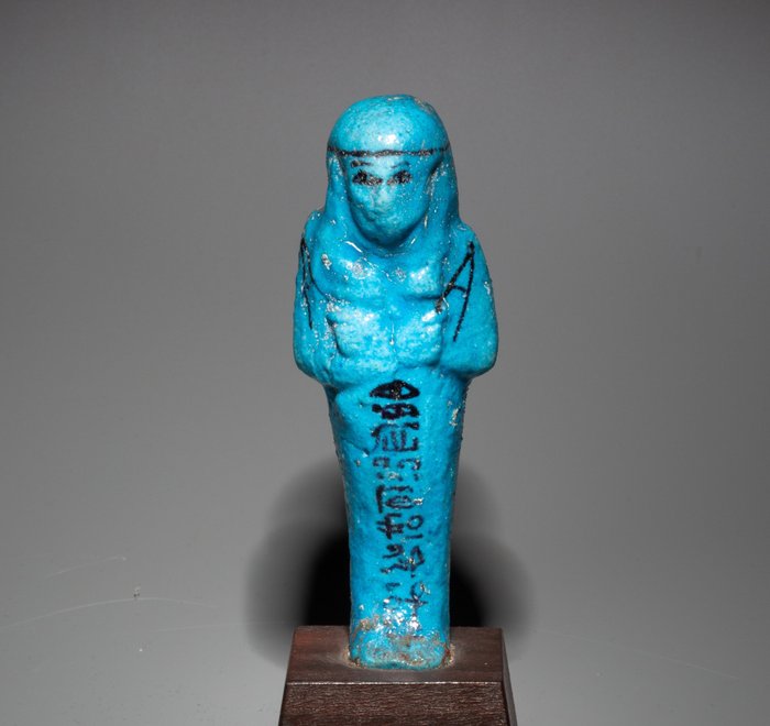 Oldtidens Egypten Fajance Shabti for tilsynsførende af kornmagasiner, Djedkhonsu-iwf-ankh. 10,5 cm H. Intakt. Spansk