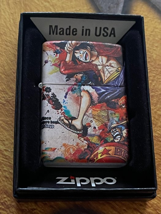 Zippo - One piece - Pocket lighter - Brass, Bronze (gilt/silvered/patinated/cold painted), Steel (stainless)