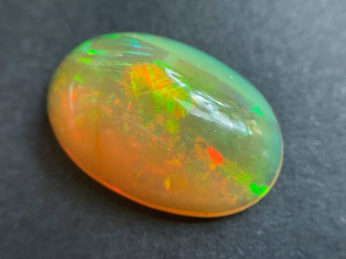 Intensivt orange+ färgspel (levande) Kristall opal - 2.58 ct