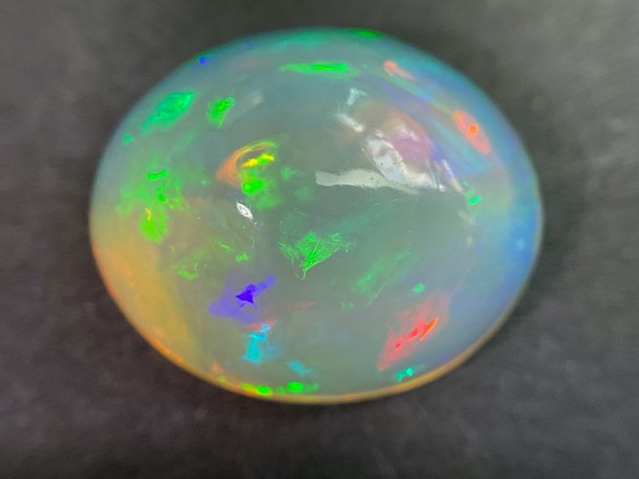 Vit (orange) + Färgspel (Vivid) Kristall opal - 2.91 ct