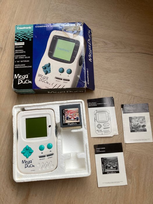 Creatonic - Mega Duck /Cougar Boy handheld console with 2 games - I original æske