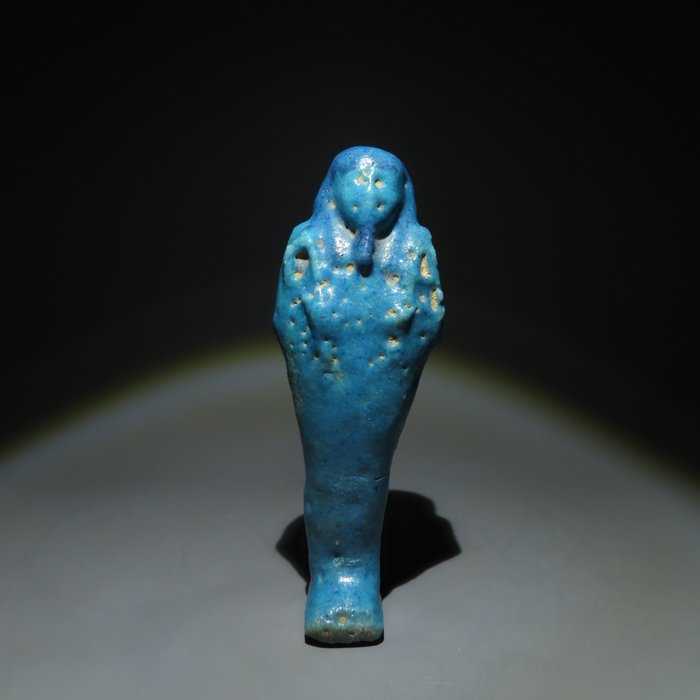 古埃及 Faience 乌舍卜提（Ushebti）。晚期，公元前 664 - 332 年。高 12 厘米。