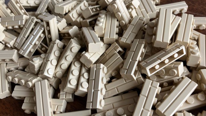 Lego - 100 pcs Brick, Modified 1 x 4 with Masonry Profile tan