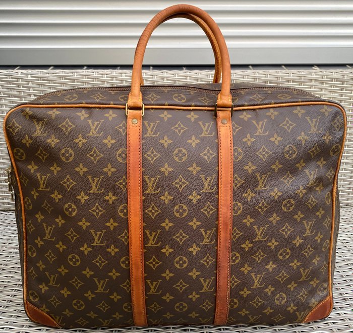 Louis Vuitton Sirius 45 Monogram Travel Bag Auction