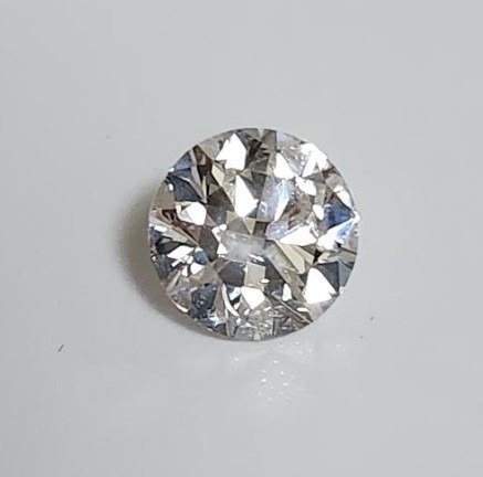 Diamant - 0.70 ct - Rund - svak rosa - Gjelder ikke