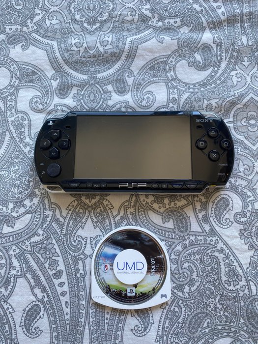 1 Sony PSP - PlayStation Portable - Konsole mit Spielen (1)