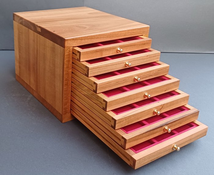 Accessories. 7-drawer solid cherry coin cabinets each composed of 12 boxes of 38x38 mm