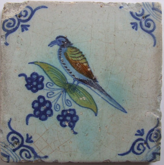 Tile - Colored bird on branch with blackberries. - 1650-1700 