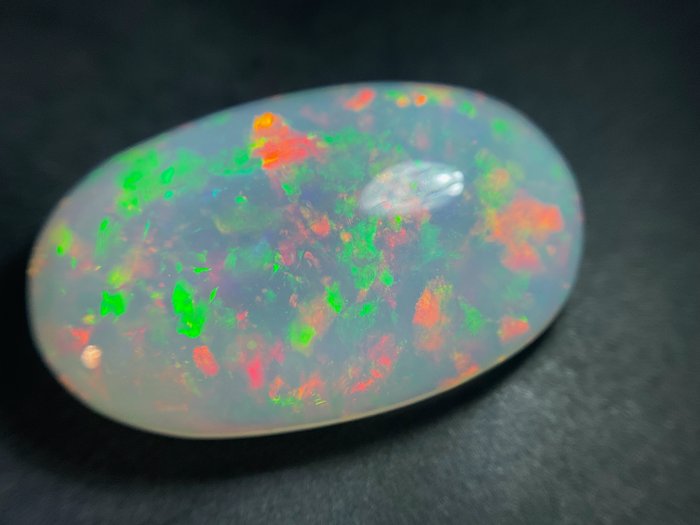 White + Play of Colors (Vivid) Fine Color Quality + Crystal Opal - 15.61 ct
