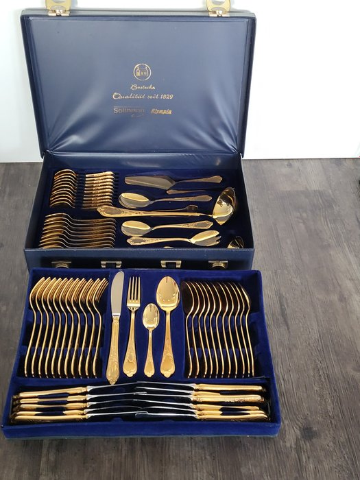 Olympia Solingen - for 12 people including serving cutlery - set di posate  di lusso placcate in oro duro da 70 pezzi decorativi e mai utilizzati -  Acciaio inossidabile 18/10 - valido - nella custodia originale - Catawiki