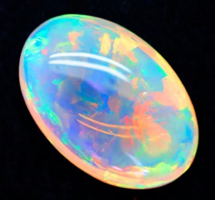 Low reserve price: Ethiopian fire opal of 29.10 carats . - Height: 29 mm - Width: 20 mm- 5.82 g - (1)