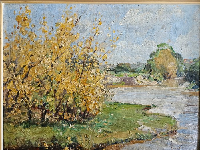 Louis Caresma (XIX-XX) - Frans landschap met rivier en bloeiende bomen