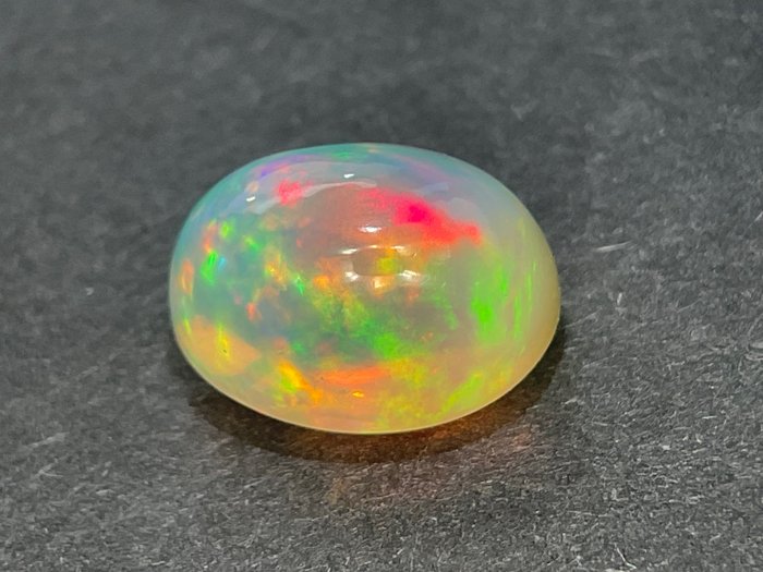 *Ingen reserve* Hvid + Farvespil (Vivid) krystal opal - 3.03 ct