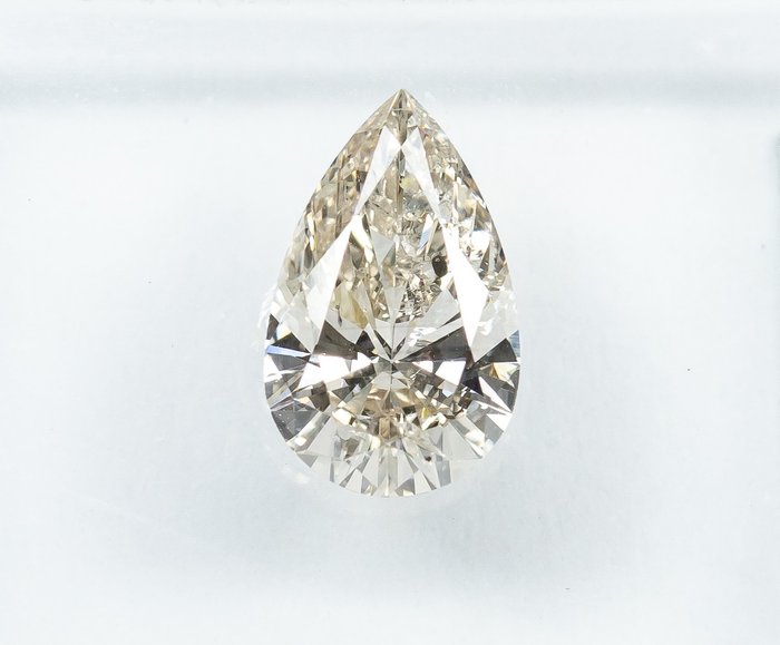 鑽石 - 0.90 ct - 梨形 - J(極微黃、從正面看是亮白色) - SI2