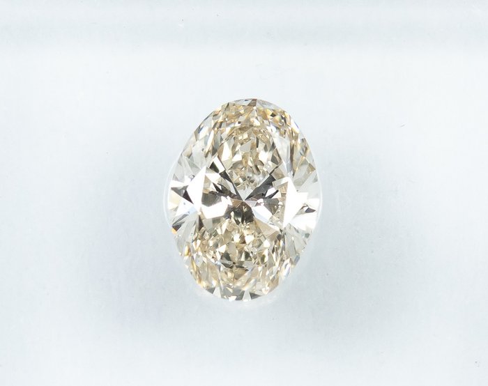鑽石 - 0.70 ct - 橢圓形 - K(輕微黃色、從正面看是亮白的) - SI1