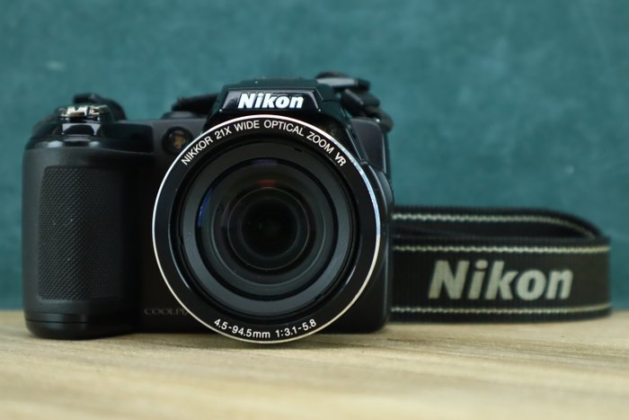 Nikon Coolpix L120 + Nikkor 4.5-94.5mm 1:3.1-5.8 Cameră digitală hibridă