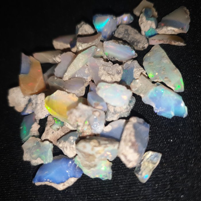 Lotto di opali Welo grezzi da 50 carati, bellissimi colori Grezzo- 10 g