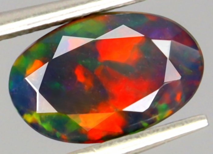 Etiopian musta opaali - 1,26 ct. - ILMAINEN TOIMITUS - Ei varausta - Monivärinen - Kiillotettu- 0.252 g