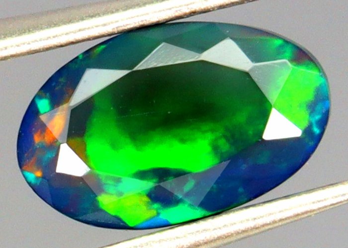 Etiopisk svart opal - 1,50 ct. - GRATIS FRAKT - Ingen reservation - Flerfärgad - polerad- 0.3 g