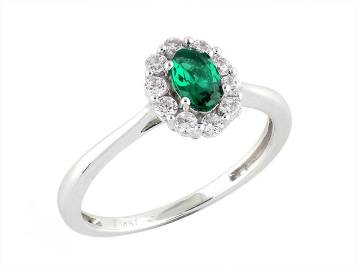 Ring - 18 karaat Witgoud -  0.61ct. tw. Smaragd - Diamant