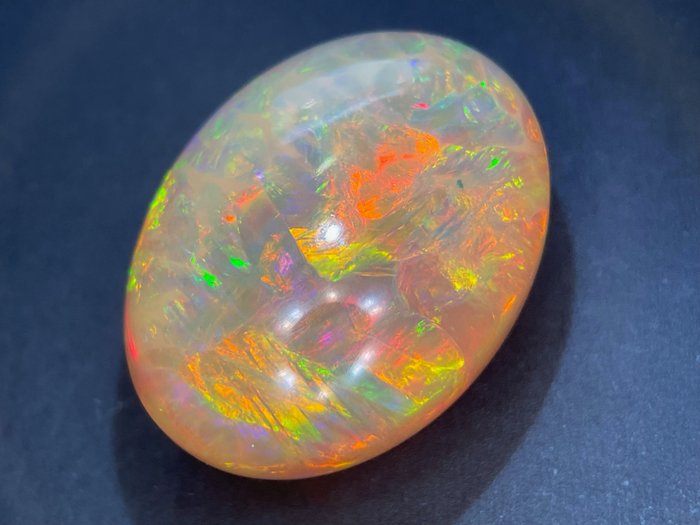 Orange mit Regenbogenfarben Natural opal - 20.40 ct