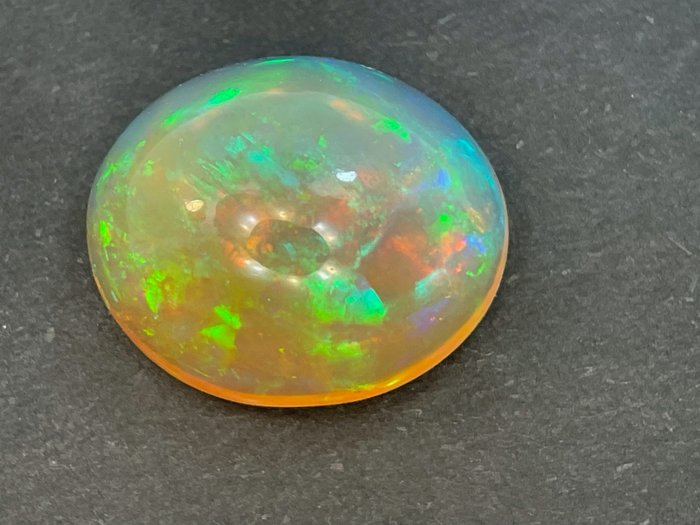 Orange+ Play of Color (Intense) Crystal Opal - 2.71 ct