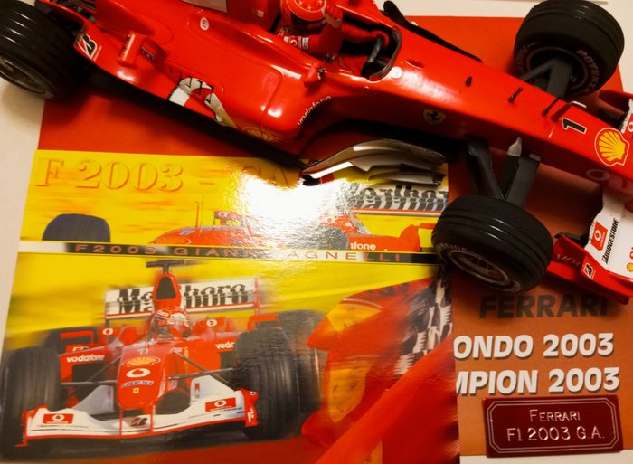 Hot Wheels 1:18 - 3 - Machetă mașină de curse - Ferrari F1 2003 G.A. (Gianni Agnelli) - Michael Schumacher