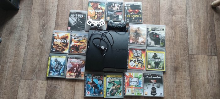Sony - PS3 console with two wireless controllers and 16 games - Videospill konsoll