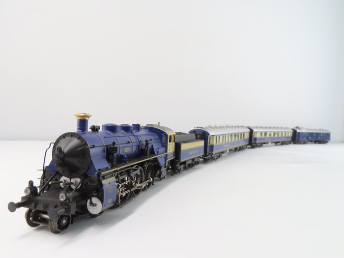 Märklin H0 - 26750 - Set de trenes (1) - Set de 6 piezas "75 años de Rheingold" con BR S3/6 18.4 y cinco carros "Full Sound" - DRG