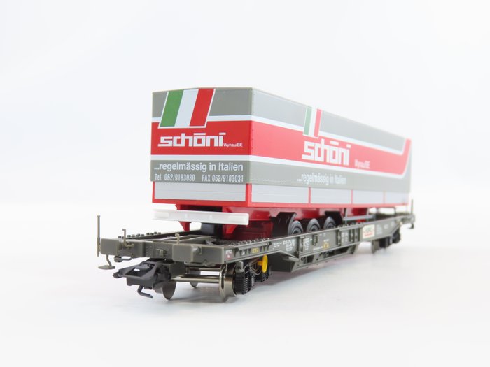 Märklin H0 - 47444 - Modellbahn-Güterwagenset (1) - Tieflader mit Anhänger als Ladung „Shöni“ - Hupac Chiasso